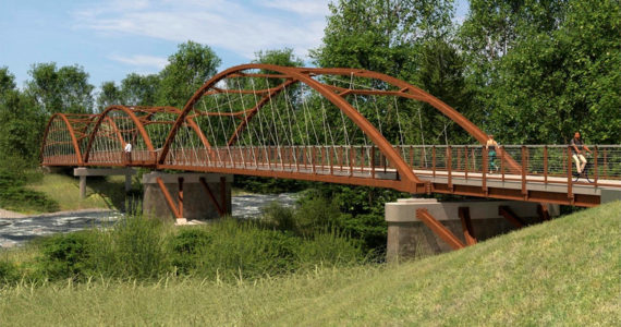 An artist rendering of the future Foothills Trail pedestrian bridge. Image courtesy King County