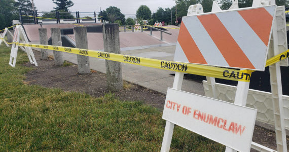 The Enumclaw skate park is closed, and caution tape will soon be replaced with fencing to keep people out until ramps are removed. Photo by Ray Miller-Still