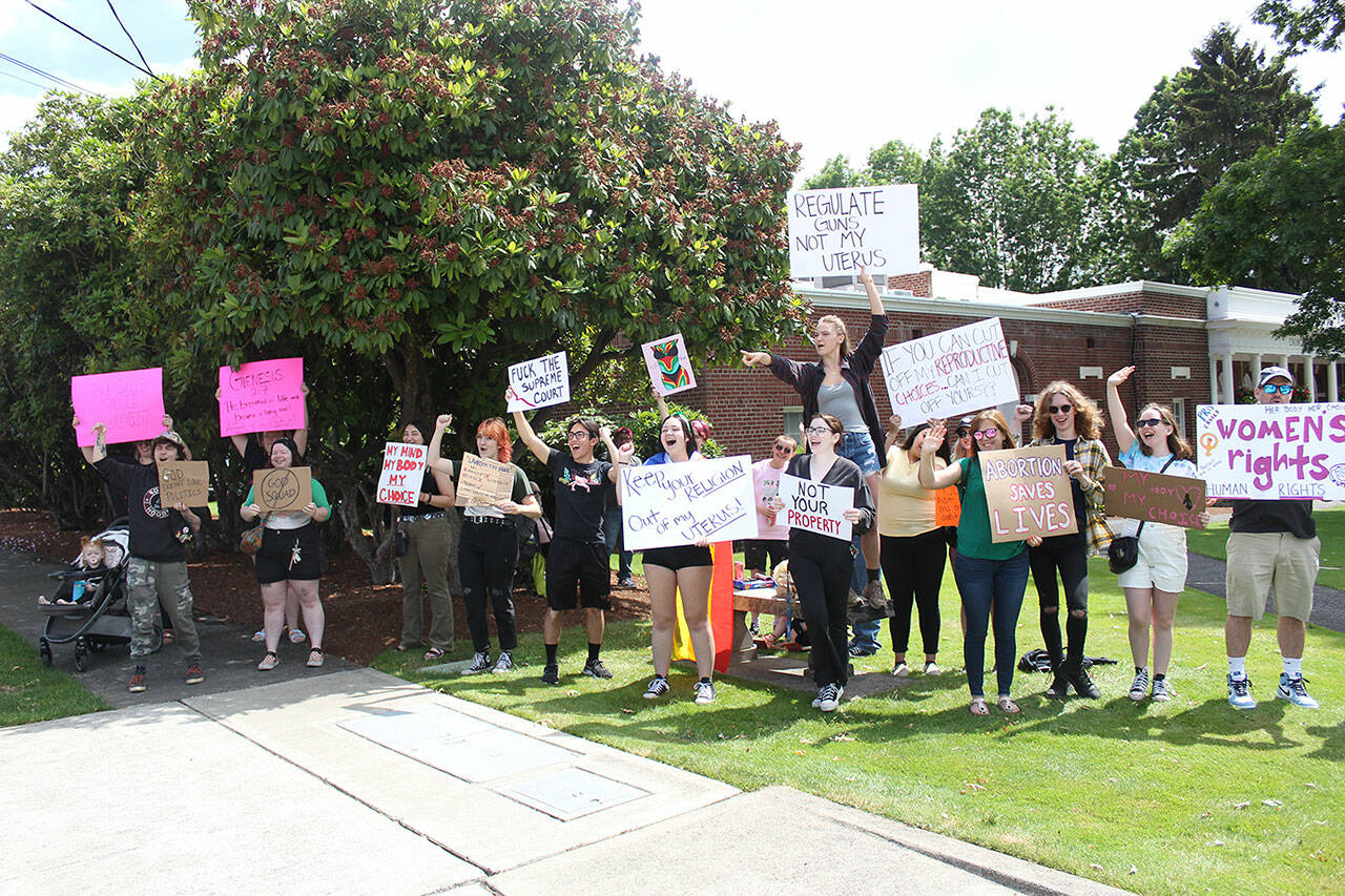 Local residents, young and old, rallied at Enumclaw City Hall June 30 to advocate for abortion choice. Photo by Ray Miller-Still