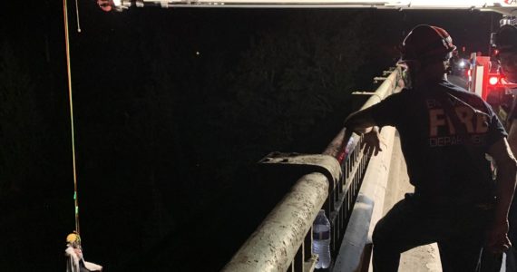 This photo, posted by a Public Information Officer, shows a Puget Sound Fire truck being used to rescue one of the people who became stranded in the Green River Sunday.