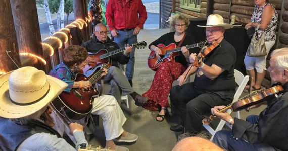 Jam sessions outside the Enumclaw Expo Center Field House are a common sight during the Northwest Western Swing Music Festival, where people can bring their instruments and join in the fun. File photo by Randy Hill, leader of the western swing band, The Oregon Valley Boys. File photo by Randy Hill, leader of the western swing band, The Oregon Valley Boys.