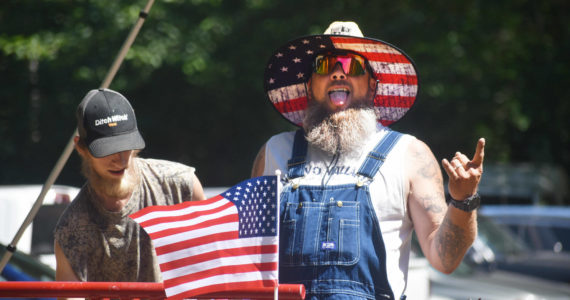 A pair of racers celebrate a triumphant moment. Photo by Alex Bruell