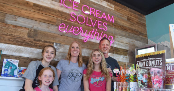 Photo by Alex Bruell
The Rattray family, from left to right: Maddin and Addison, April, Kaitlin and Bill pose for a photo at their new ice cream shop in Buckley.