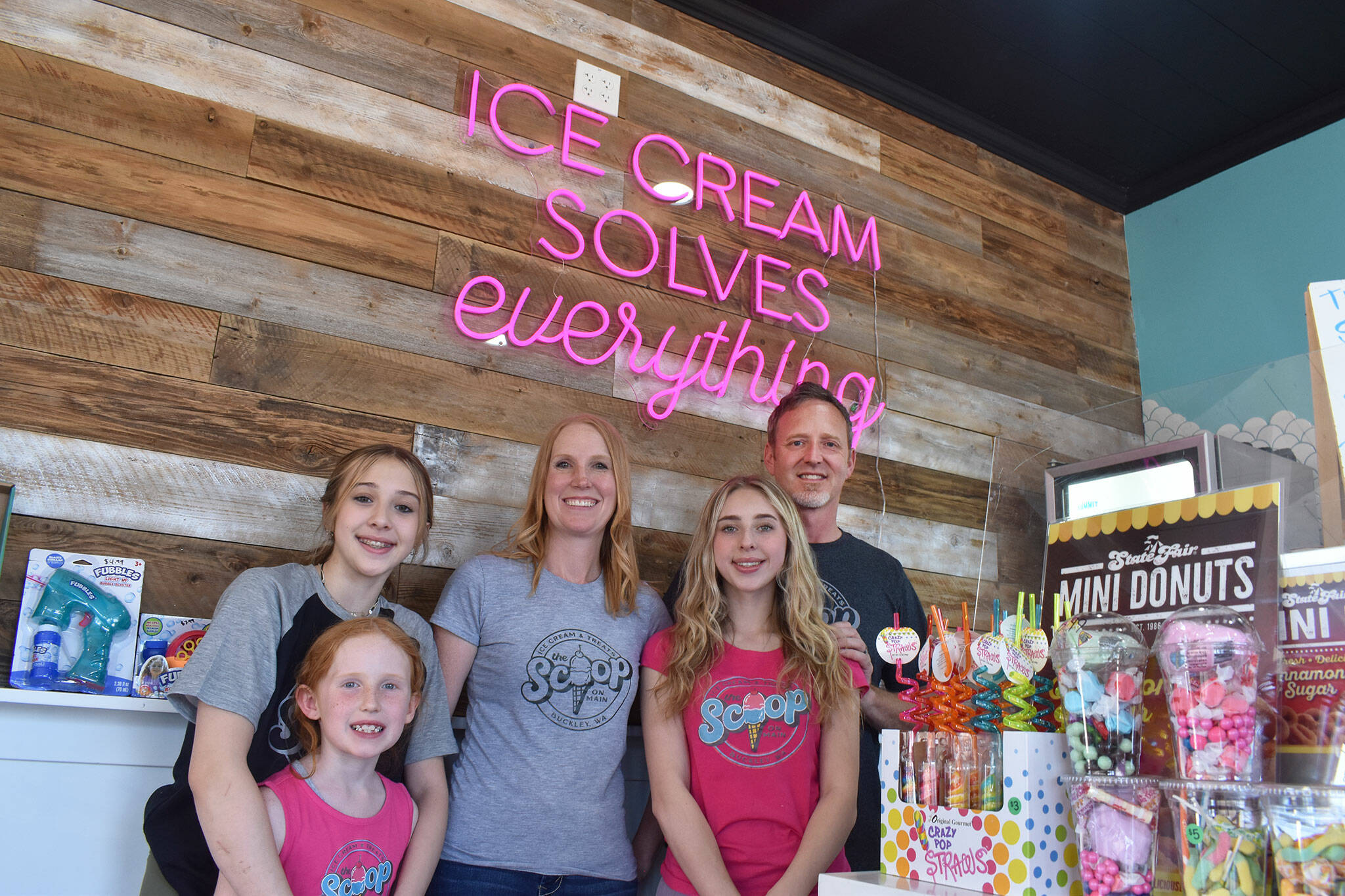 The Rattray family, from left to right: Maddin and Addison, April, Kaitlin and Bill pose for a photo at their new ice cream shop in Buckley. Photo by Alex Bruell.