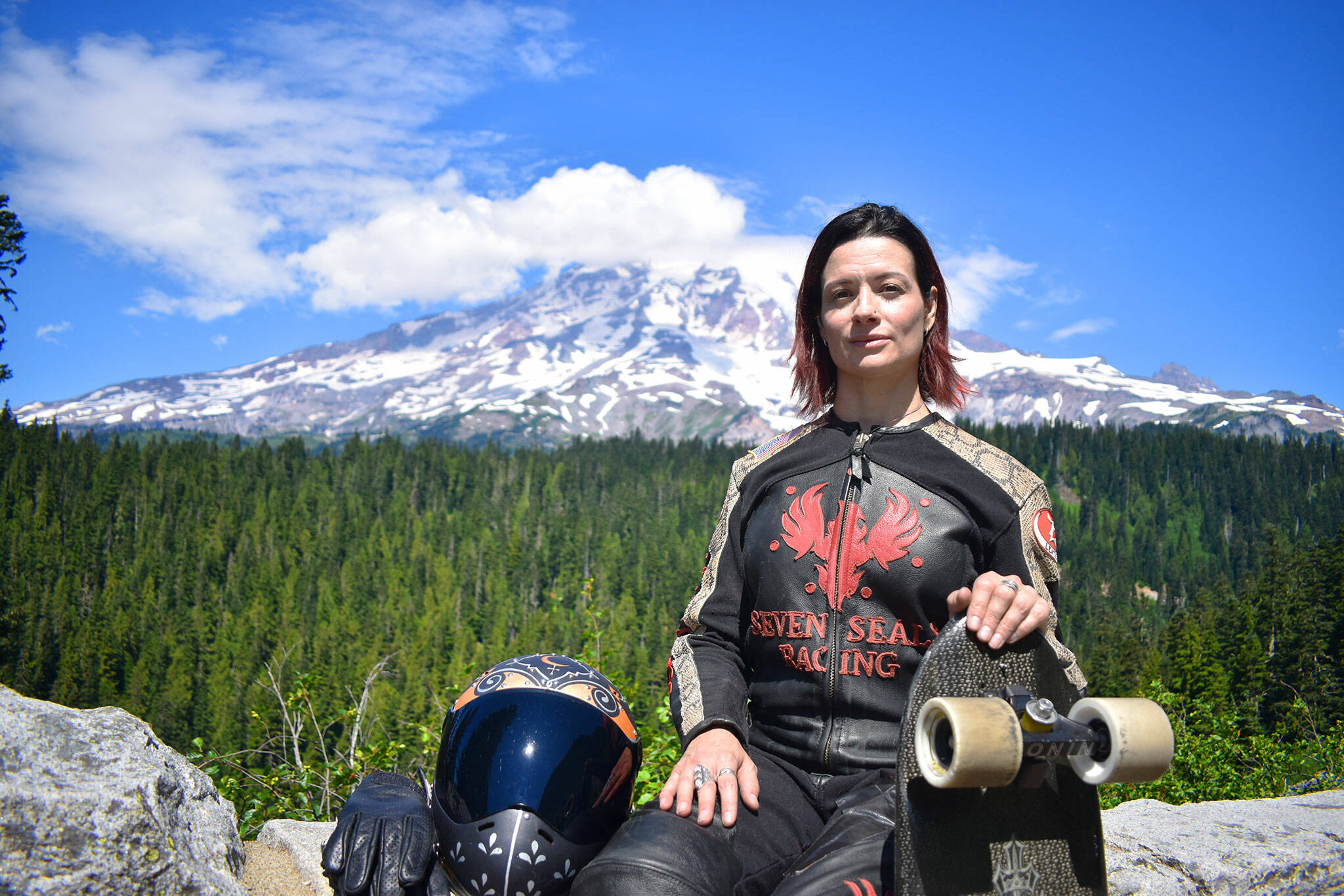 Marcie Morgan, downhill skateboarder, poses for a picture at the Mount Rainier National Park on Friday, Aug. 12.