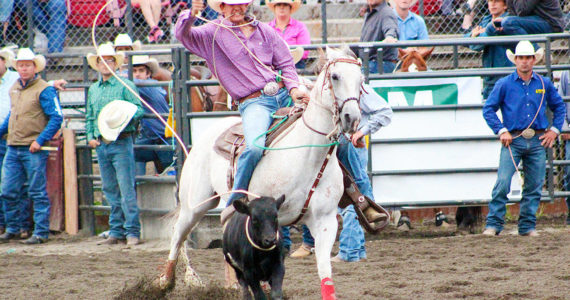 Pictured is Preston Pederson, who managed to net his calf in 2019s tie down roping event in just 8.48 seconds. Photo by Ray Miller-Still