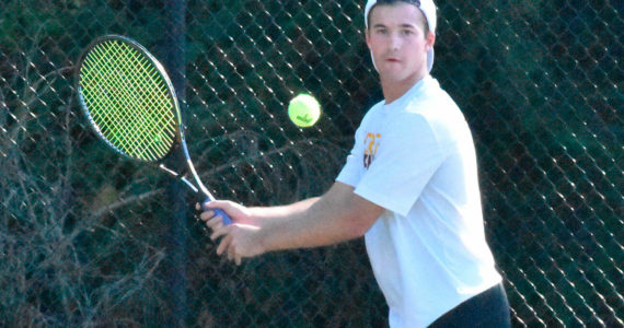 White River's Tate Ringel has moved into the No. 1 singles slot for the  Hornets. Pictured here during the September 6 season opener, he picked up a victory over a Fife opponent. Photo by Kevin Hanson