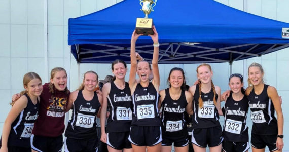 SUBMITTED PHOTO The Enumclaw High girls’ cross country team captured top honors during last weekend’s league meet and is now headed to district competition. Pictured, from left, are: Olena Simpson, Lily Pedersen, Jasmine Dumontet, Lindsay Essex, Ava Sawyer, Ahna Lemeshko, Anali Johnson, Lily Haas and Brynne Stafford (not pictured are June Carter and Neela Lantres).