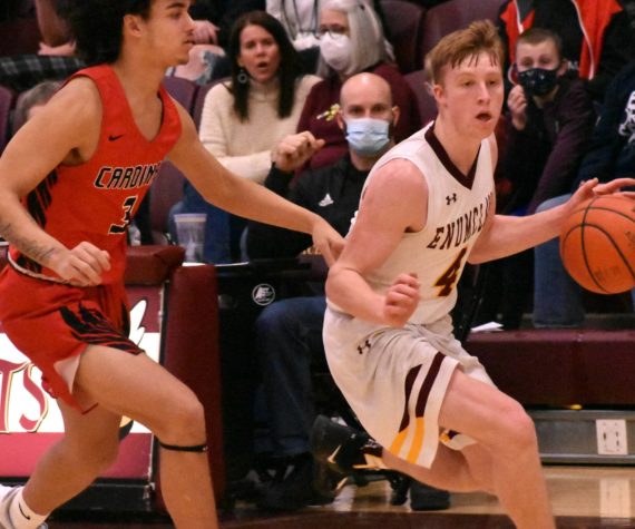 <p>FILE PHOTOs BY KEVIN HANSON </p>
                                <p>Enumclaw High’s Noah Seabrands drives to the hoop during a game last season against the Orting Cardinals. Now a senior, Seabrands earned second team, all-league honors a year ago.</p>