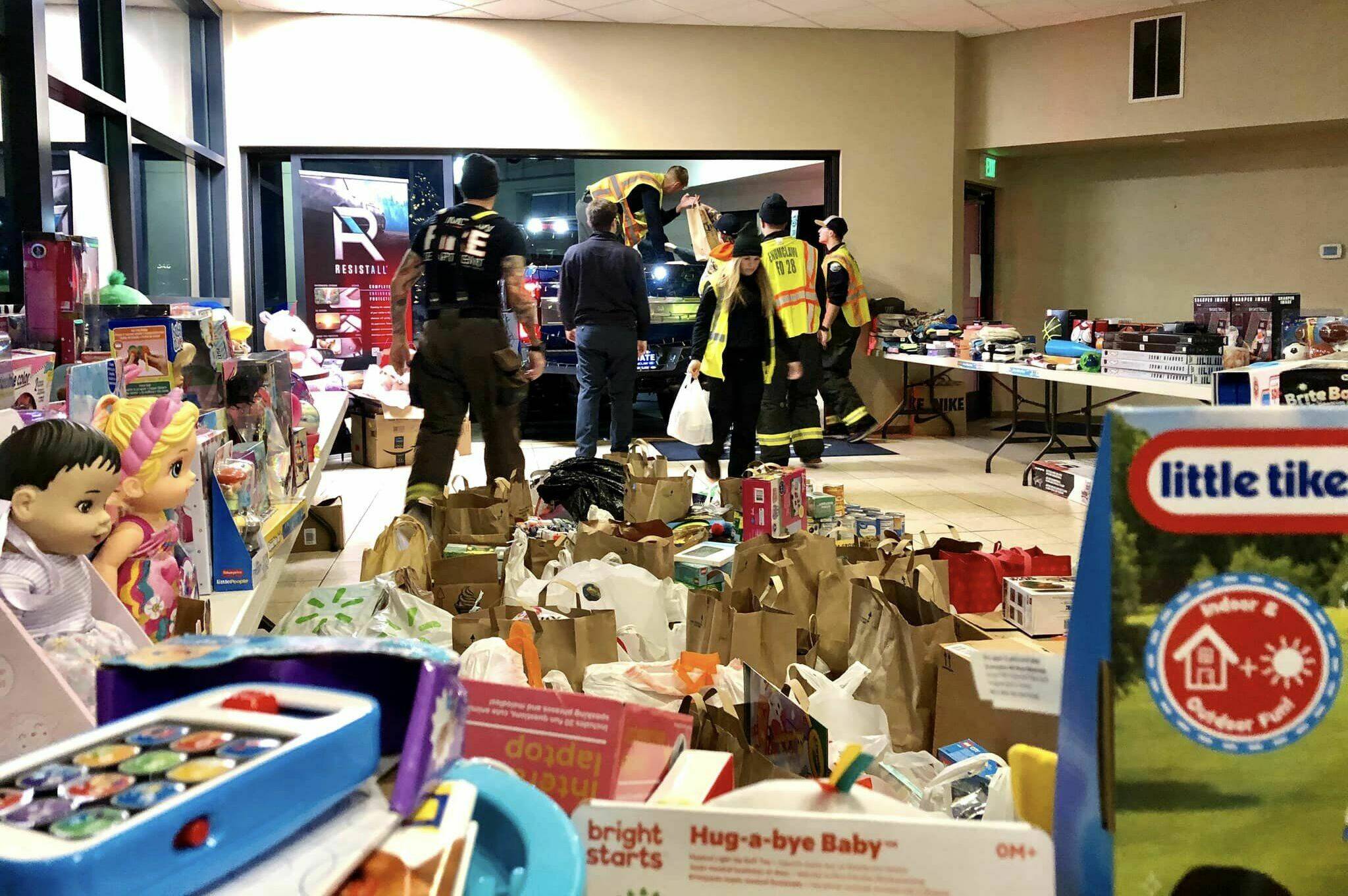 The Enumclaw Fire Department shared this photo from their recent Santa Run, which filled five pickup trucks with donations along with $1,300 in cash donations. All were sent to the Plateau Kids Network and Plateau Outreach Ministries to be distributed to families in the community. Several fire department vehicles and 25 fire personnel (plus their families) were involved in the effort, along with personnel and resources from the Enumclaw Police Department. Photos taken from the Enumclaw Fire Department's Facebook page