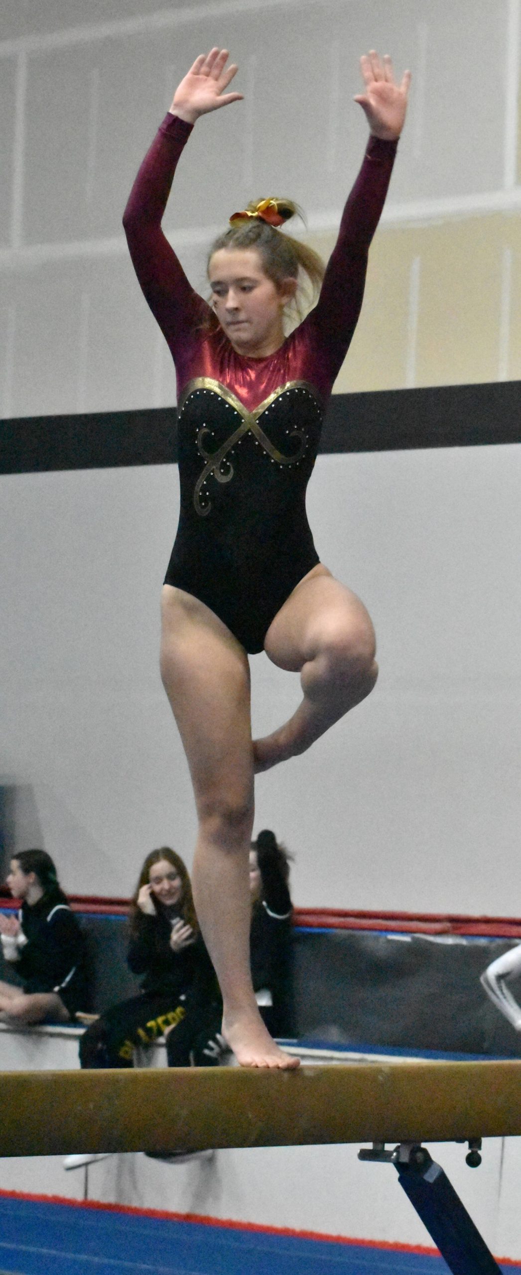 Pictured is Aislinn Binder on beam. Photo by Kevin Hanson