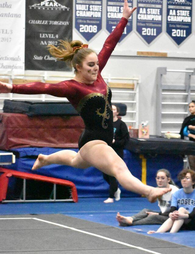 Competing for Enumclaw last Friday night was Ashley Dickerson in the floor exercise, among others. Photo by Kevin Hanson