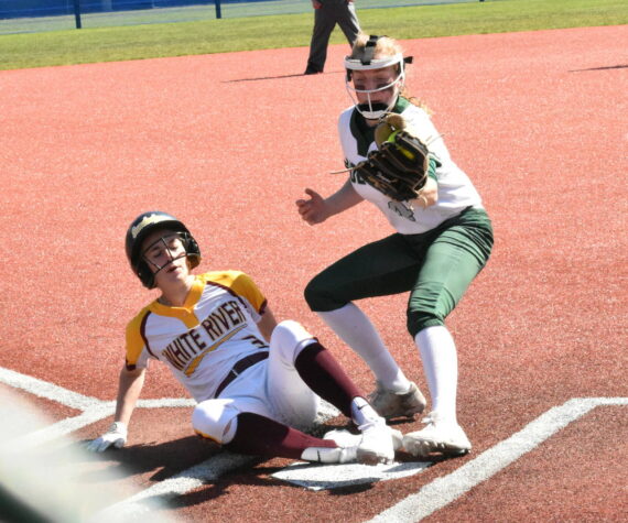 White River's Kennedy Selander, pictured here scoring a run during district action last spring, will be found at second base for the Hornets. Now a junior, she was a first team, all-league selection a season ago. Photo by Kevin Hanson
