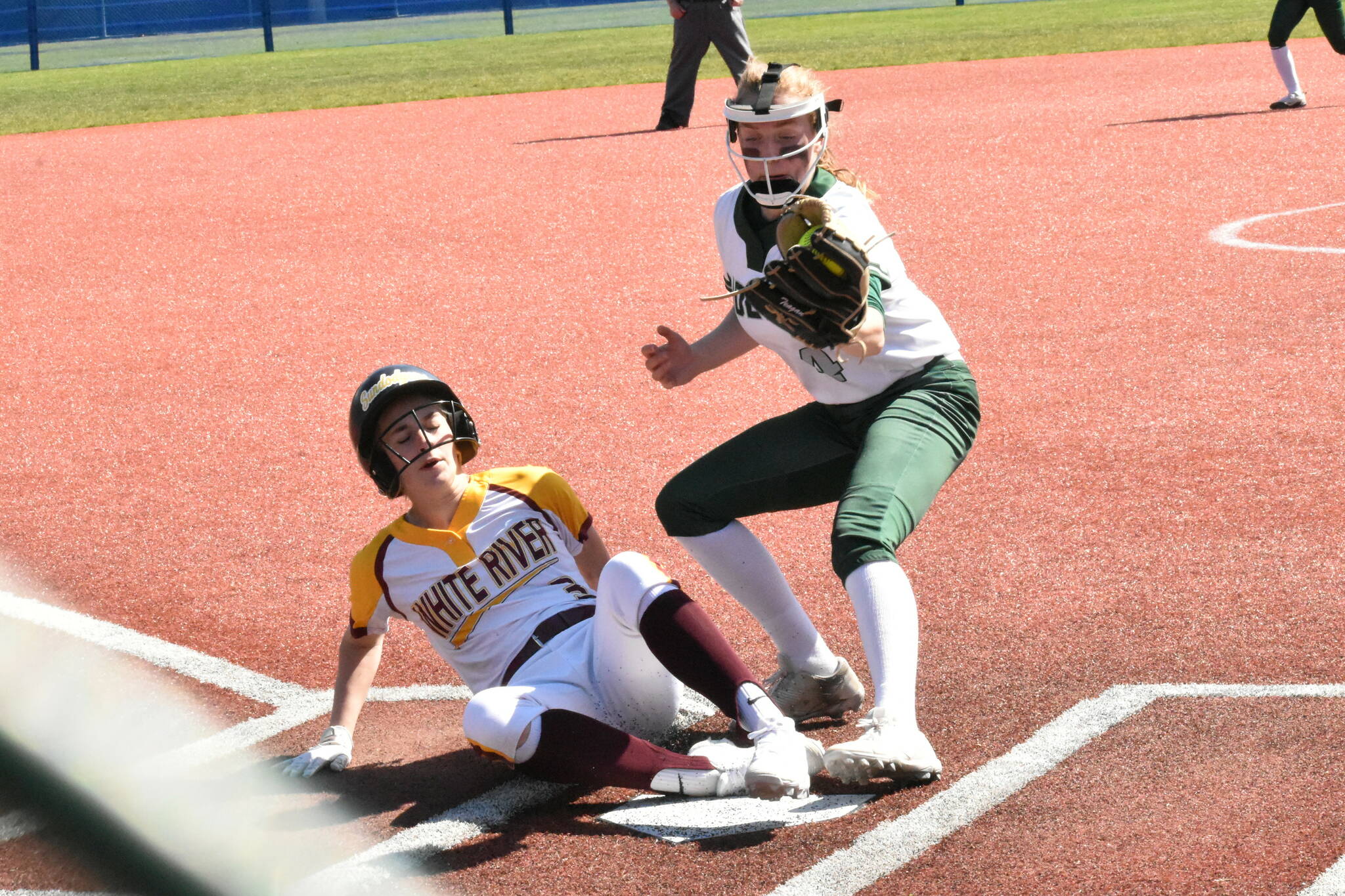 White River’s Kennedy Selander, pictured here scoring a run during district action last spring, will be found at second base for the Hornets. Now a junior, she was a first team, all-league selection a season ago. Photo by Kevin Hanson