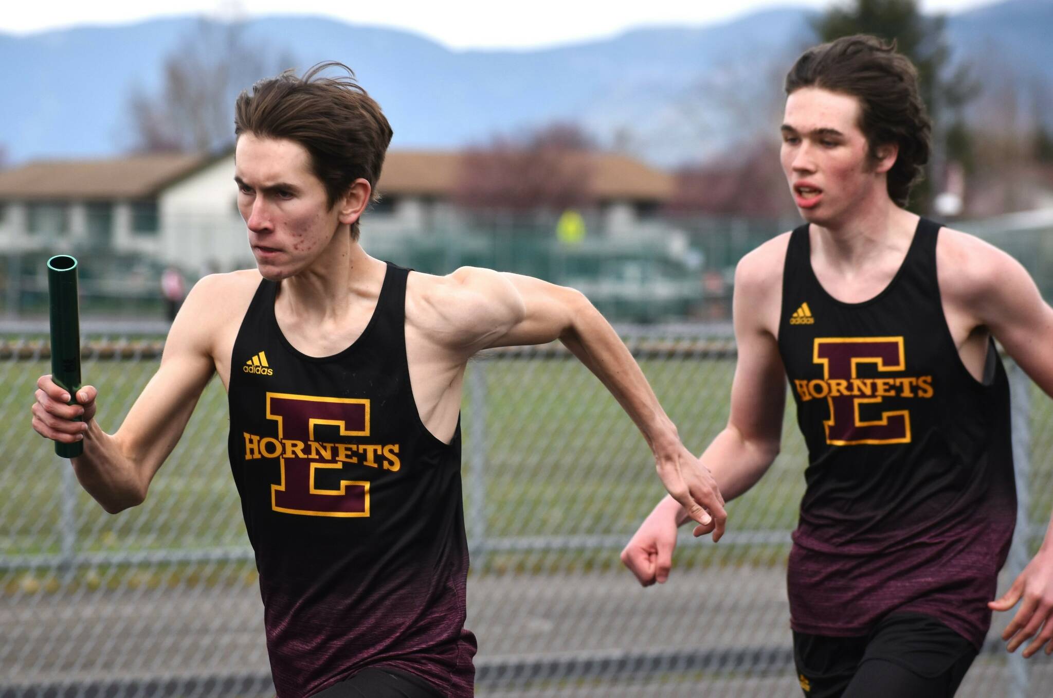 After taking a brief hiatus for spring break, the Enumclaw High track and field crew returns to action with a road meet against the Orting Cardinals. Action gets under way at 3:30 p.m. Thursday at Cardinal Stadium. Among the regulars who represent EHS are Michael Poleski (left) and Jack Heise, both members of the boys’ relay squad. These photos came during the Hornets’ last home meet. Photo by Kevin Hanson