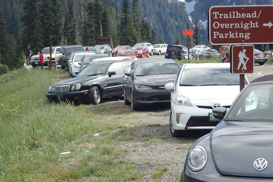 Photo courtesy National Park Service
Parking at Paradise inside Mount Rainier National Park is becoming a nightmare, with many cars parking alongside the road when the official lot is full. Draft plans to limit the number of cars and people that can access popular parts of the park are being evaluated.
