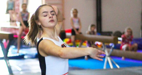 Alysen Posey finishes up rehearsing her floor routing at Peak Gymnastics. Photo by Ray Miller-Still