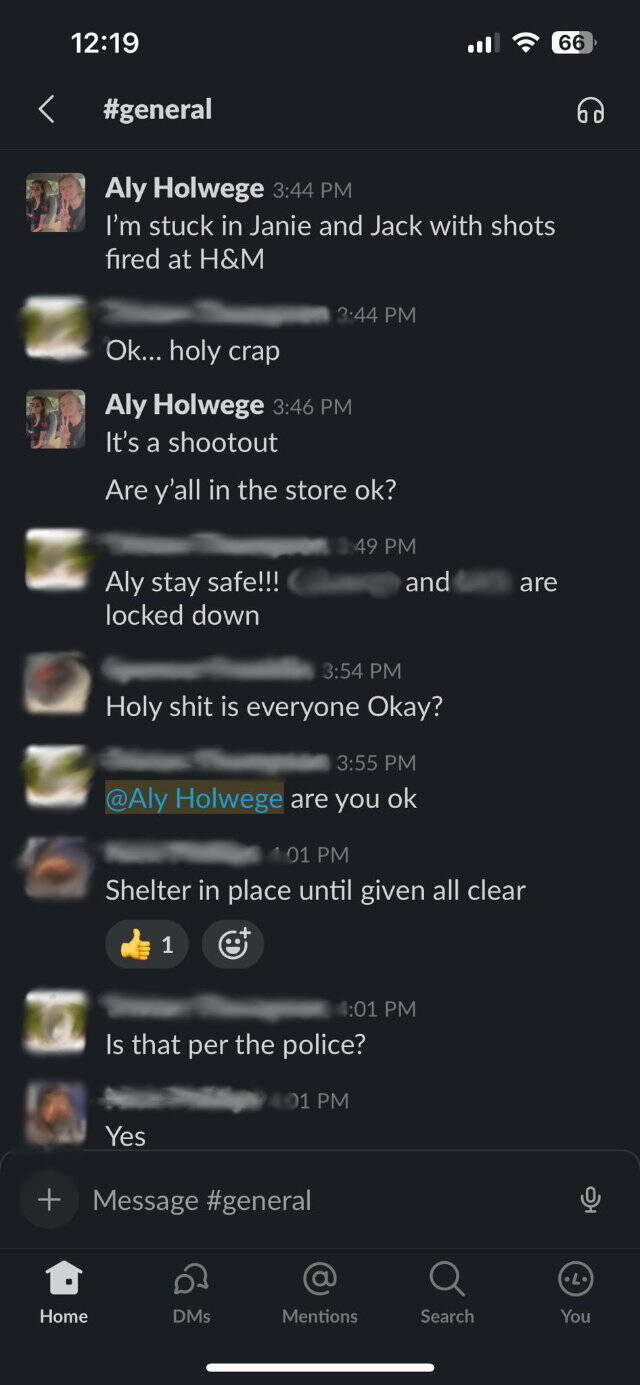 A message thread between Alyson and her co-workers at Grunt Styles during the May 6 Allen Premium Outlet shooting. Names and photos of the other participants have been blurred to protect their privacy. Screenshot