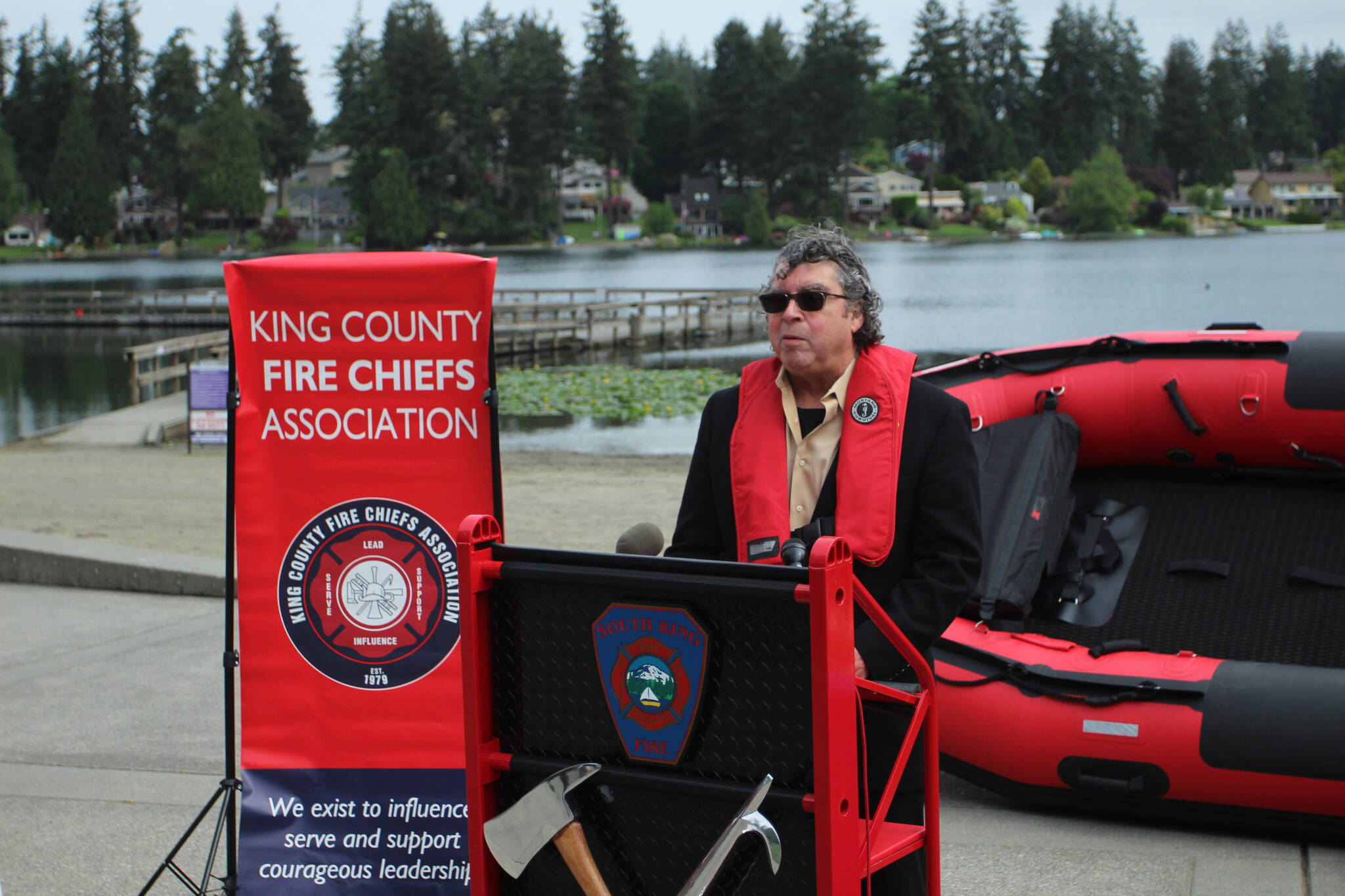 Tony Gomez, Violence and Injury Prevention manager for Public Health - Seattle & King County, speaks on water safety at Steel Lake Park in Federal Way on May 23. Olivia Sullivan / The Mirror