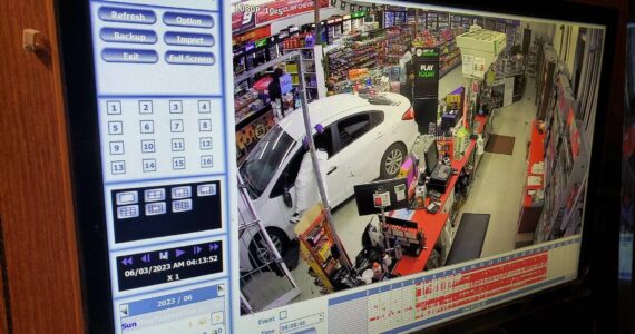 Unknown persons used a car to back into the Enumclaw Chevron station off SR 169 in the early hours of June 3. In this security footage, you can see the driver exiting the car via the window.