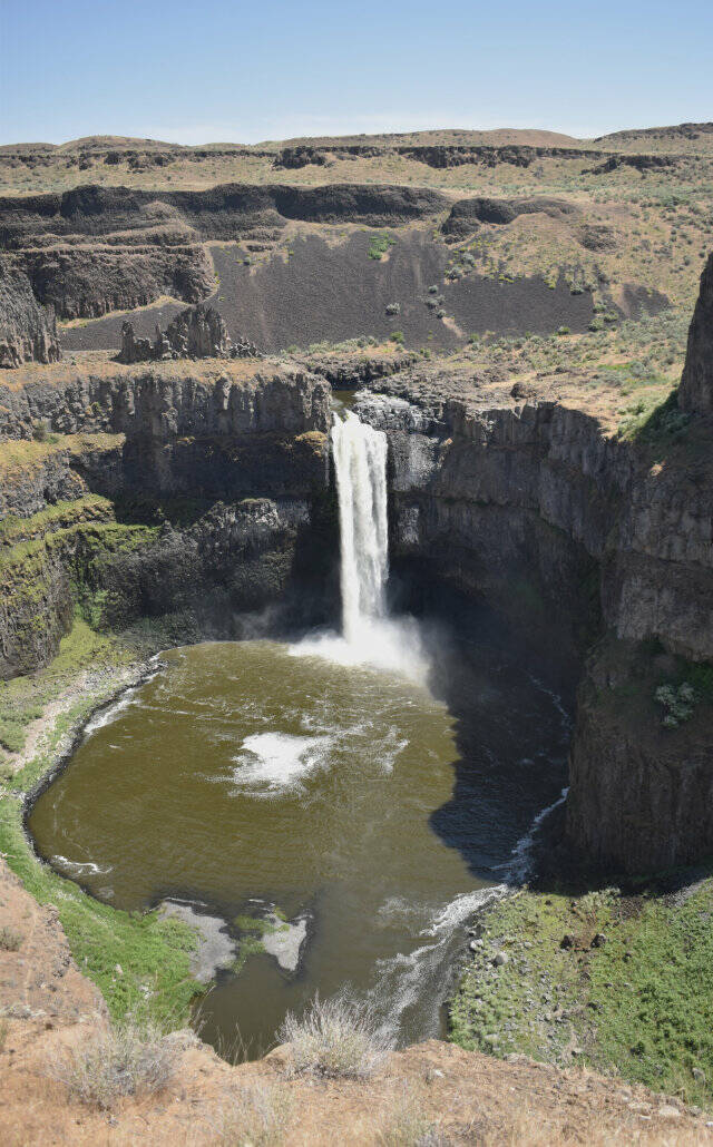 Just a short stroll away from the entry to the Palouse Falls State Park Heritage Site is the 200-foot falls that was created some 13,000 years ago. Signs on nearby trails are deadly serious, warning that people have perished after not following the rules. Covering all their bases, park officials even warn against harassing the resident rattlesnakes. Photo by Kevin Hanson
