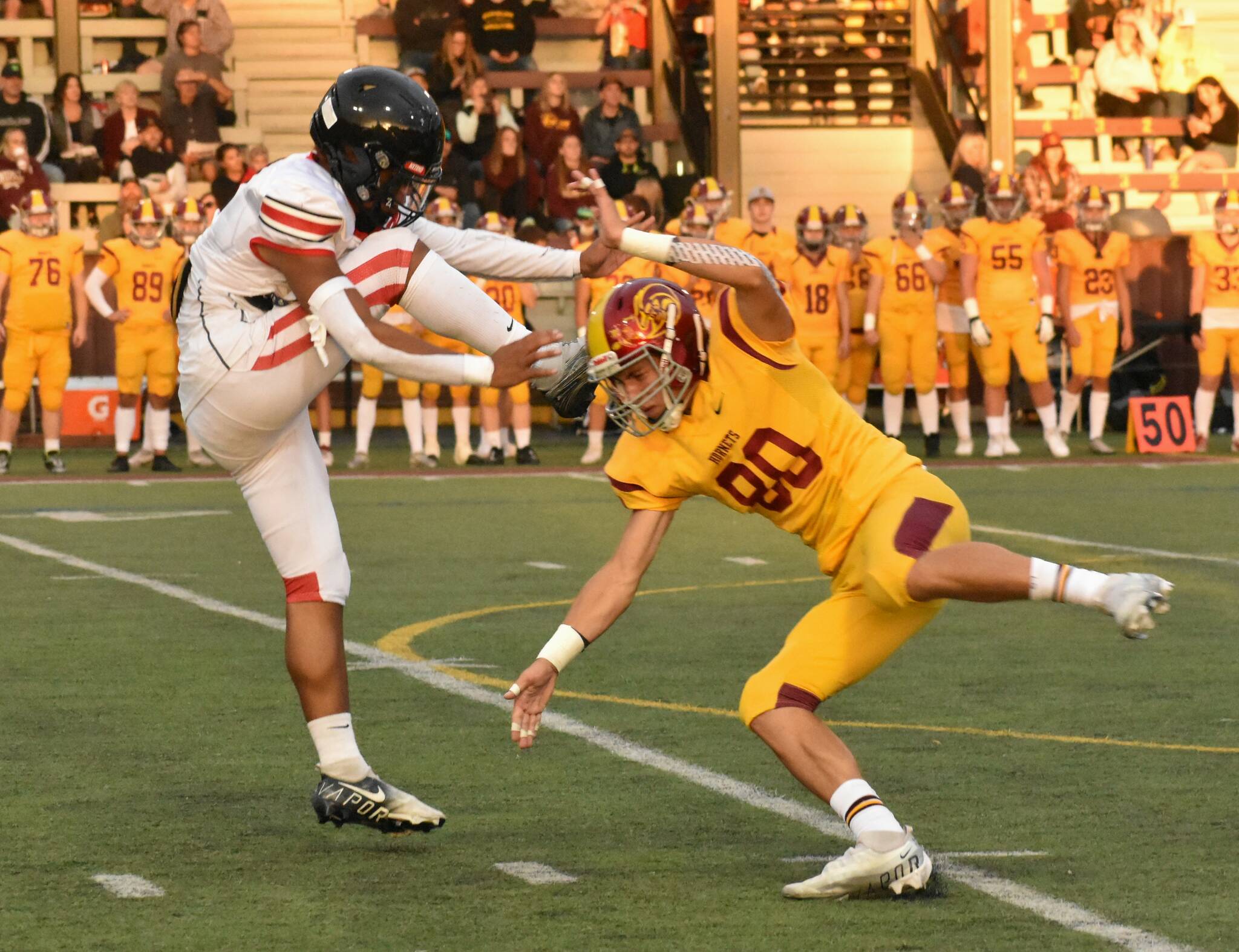 PHOTOS BY KEVIN HANSON
The Hornets’ Karson Holt coming very close to blocking a Franklin Pierce punt.