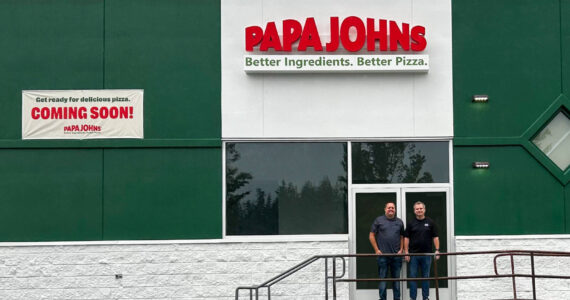 Franchise Owners Jesse Smith, left, and Matt Edwards, right, at the new Papa Johns, coming soon to Bonney Lake. Photo courtesy Papa Johns