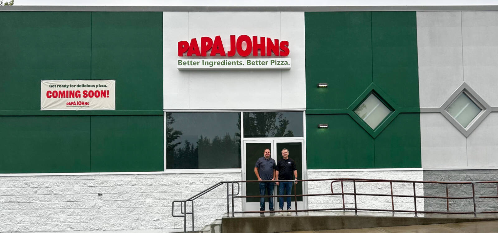 Franchise Owners Jesse Smith, left, and Matt Edwards, right, at the new Papa Johns, opening soon in Bonney Lake. Photo courtesy Papa Johns