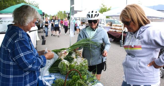 The annual Enumclaw Farmers Market on First Avenue runs every Thursday from 3 to 7 p.m. through September. To learn more, enumclawplateaufarmersmarket.org. (File photo)