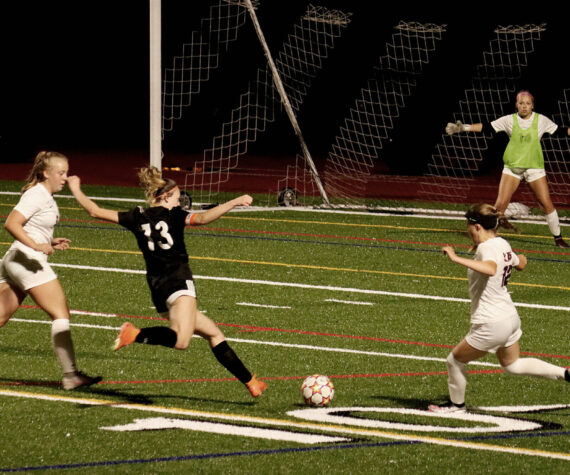 <p>Jaylee Reynolds’ four-goal spectacle propels the Bonney Lake Panthers to a commanding 4-1 victory over the Silas Rams on a cold and rainy Thursday night. Photo by Andy Orozco</p>