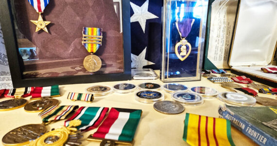 Photos by Ray Miller-Still
The Buckley Foothills Historical Museum is unveiling a new local veterans exhibit on Veterans Day weekend, Nov. 11 and 12. Some of the items featured is a WWI Purple Heart from Corporal John Abraham and the marine uniform of Buckley Senior Center Coordinator Chloe Mickelson.