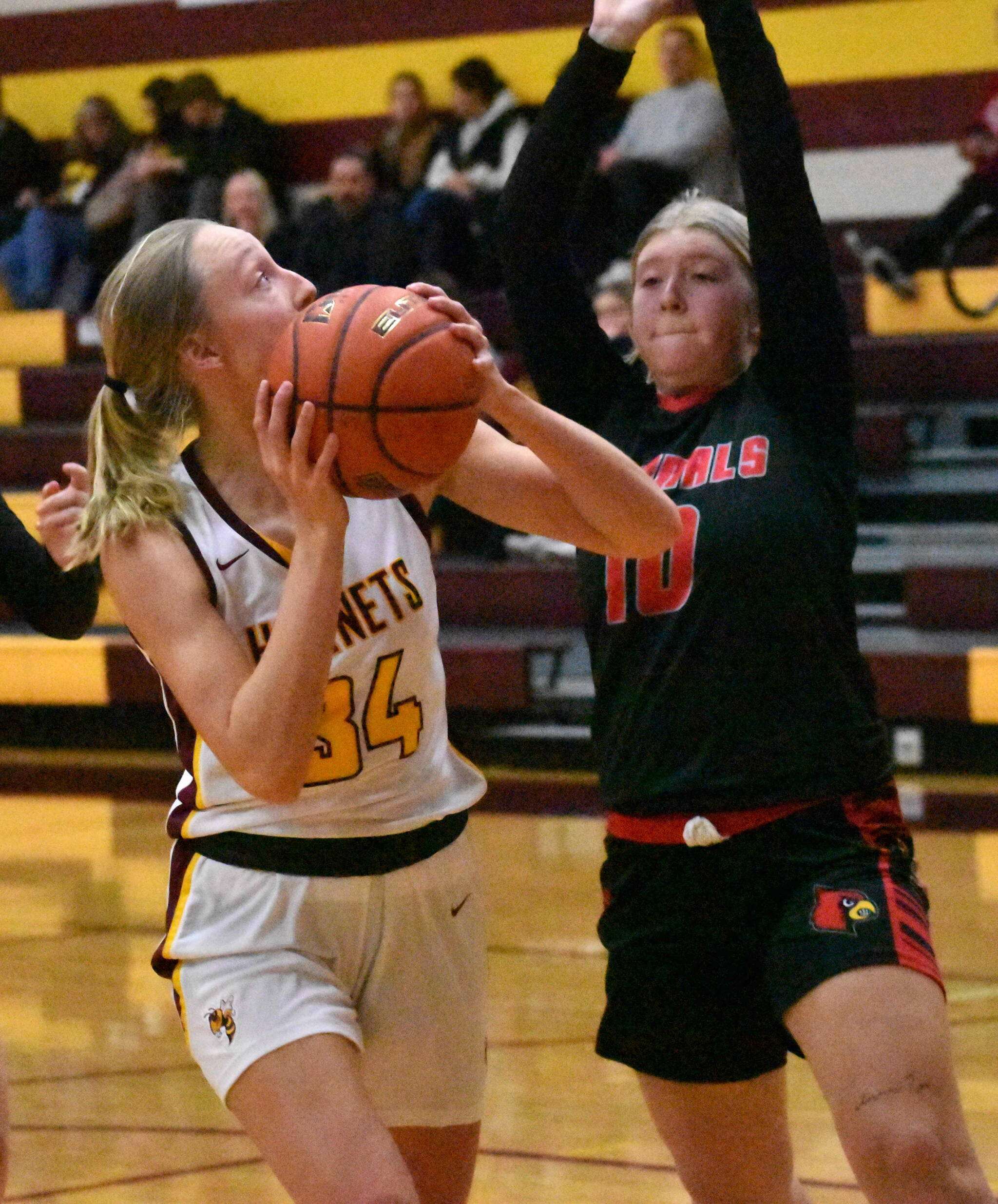 Photo by Kevin Hanson
WRHS’ Vivian Kingston (34) prepares to put up a shot under the basket during a match against the Orting Cardinals last year; the Hornets came away with a 68-16 win.