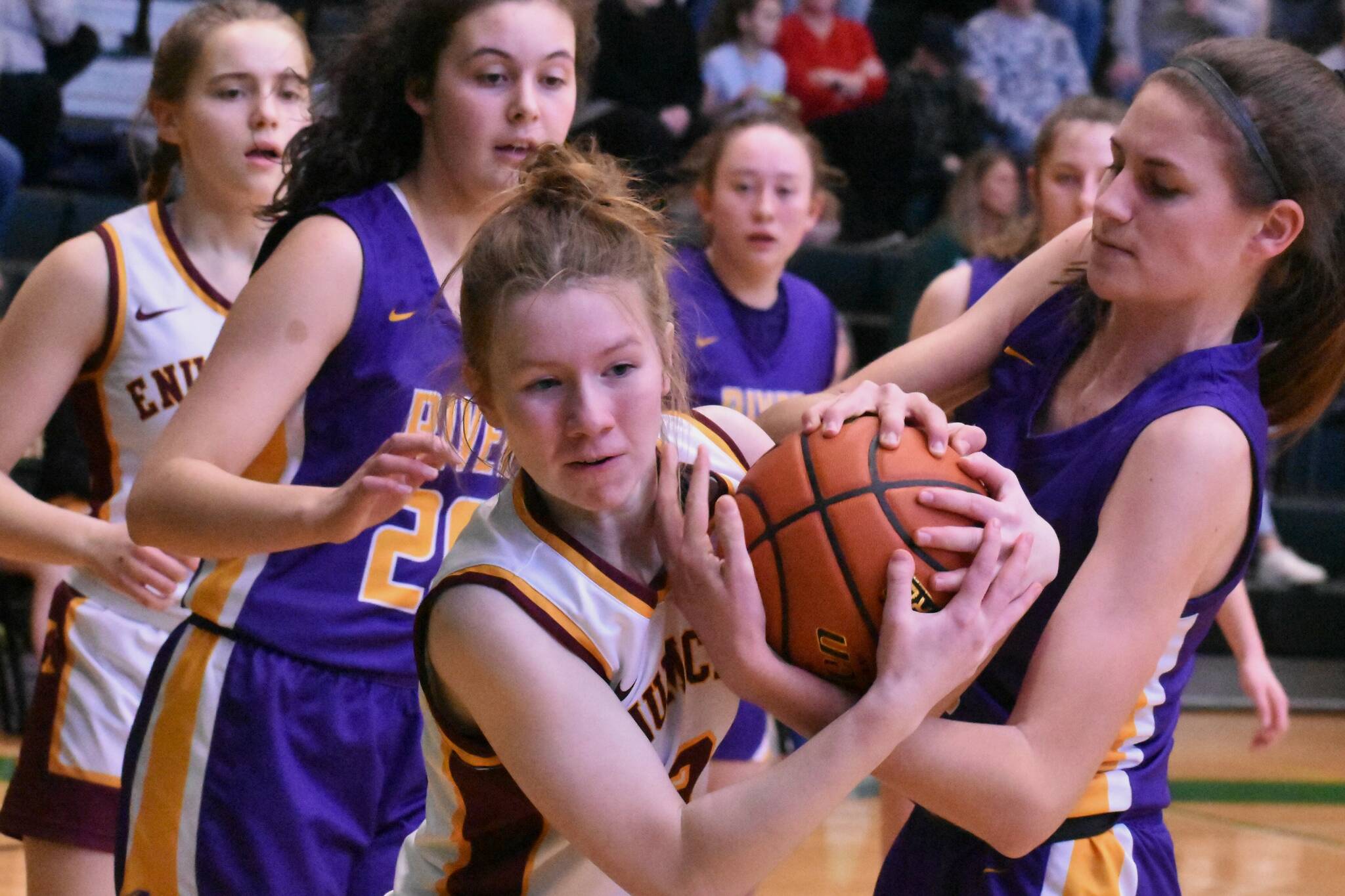 Enumclaw's Kalee Swanson wrestles for a loose ball during a successful match last season over the Columbia River Rapids. Photo by Kevin Hanson