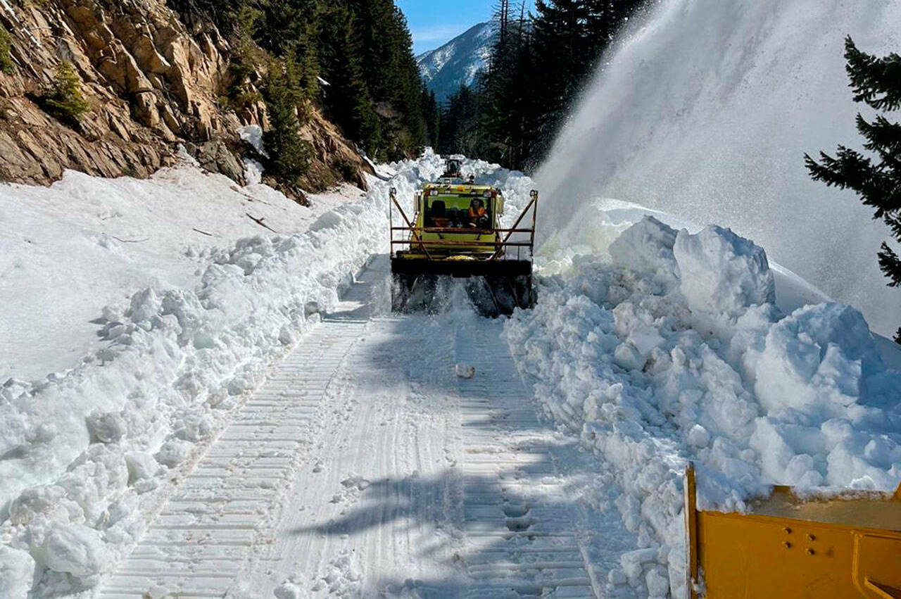 Photo by Washington State Department of Transportation
WSDOT workers clearing snow at Chinook Pass in 2021.