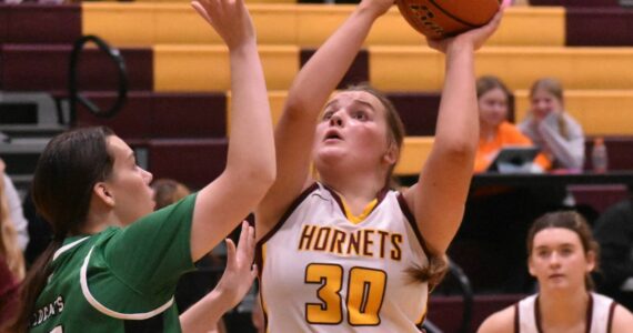 White River senior Ella Klemkow looks to score an inside bucket against the visitors from Utah’s South Summit High. Photo by Kevin Hanson