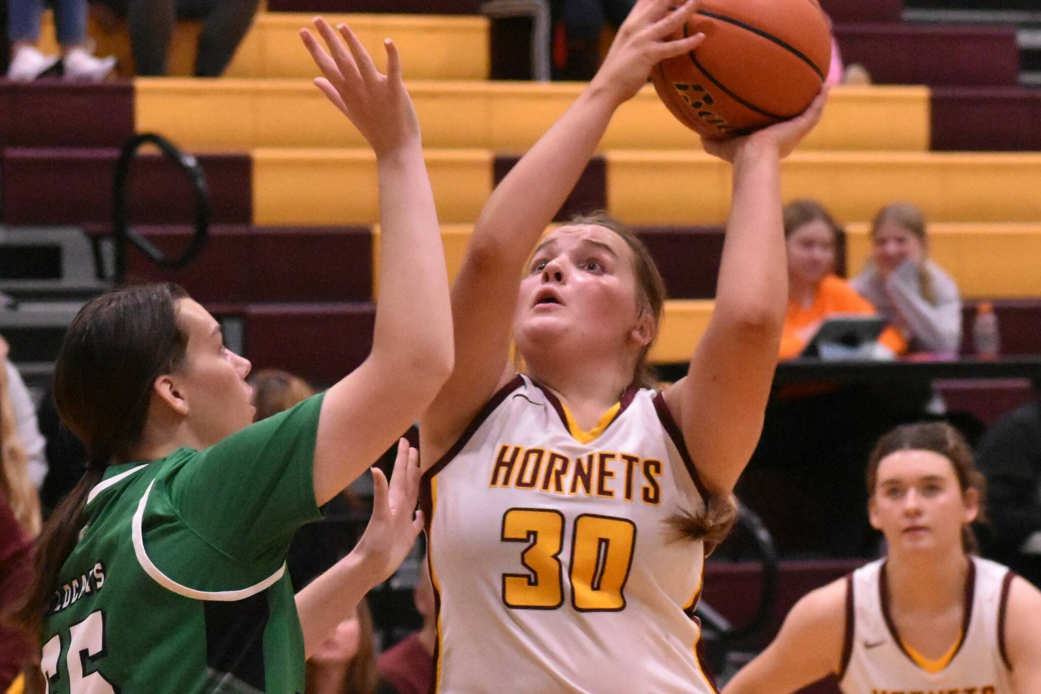 White River senior Ella Klemkow looks to score an inside bucket against the visitors from Utah's South Summit High. Photo by Kevin Hanson