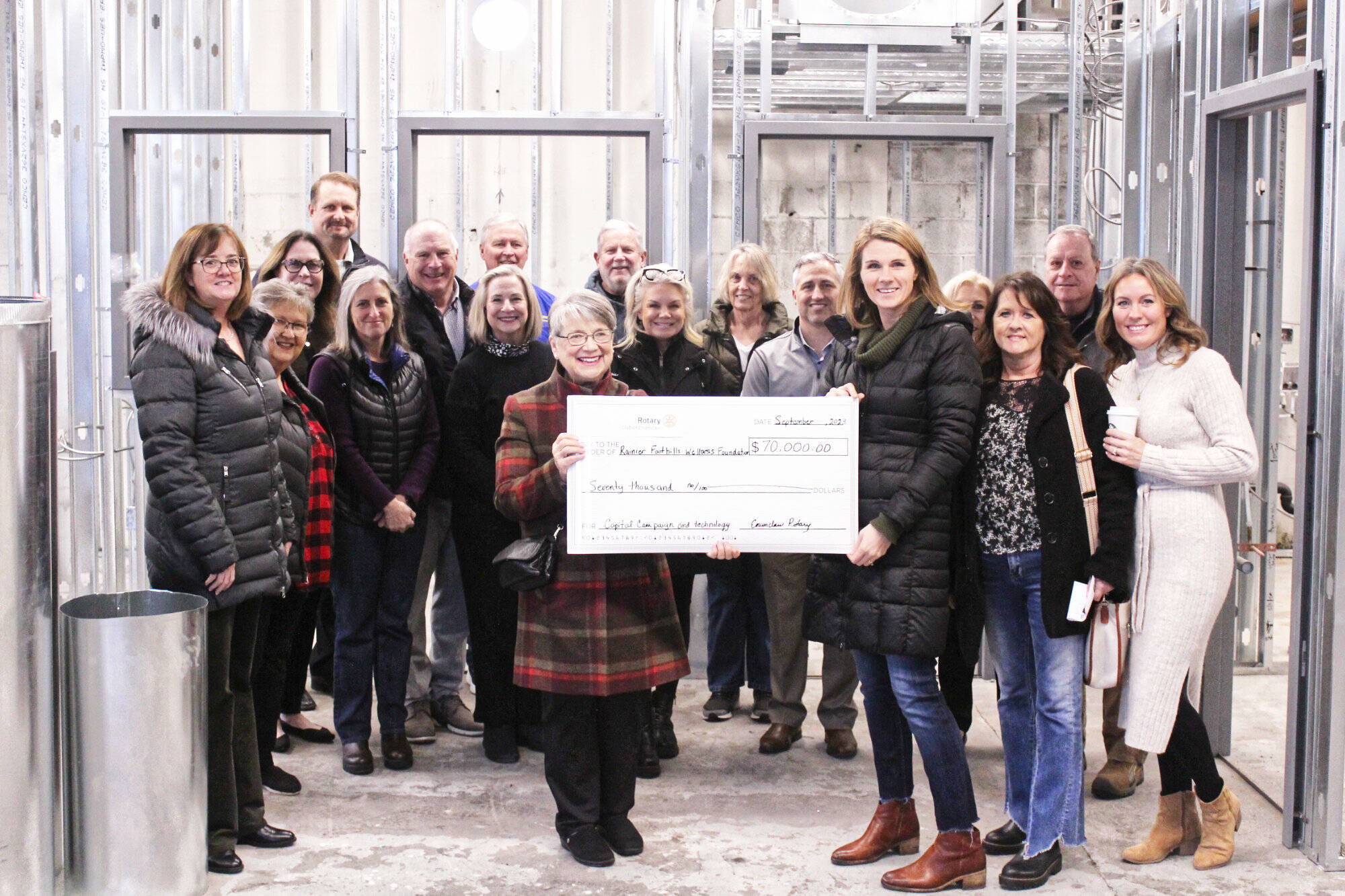 Photo by Ray Miller-Still
The Enumclaw Rotary and the Rainier Foothills Wellness Foundation met inside “The Foundation” on Jan. 15 to celebrate a grant of $70,000 so RFWF can finish renovations inside its new home.