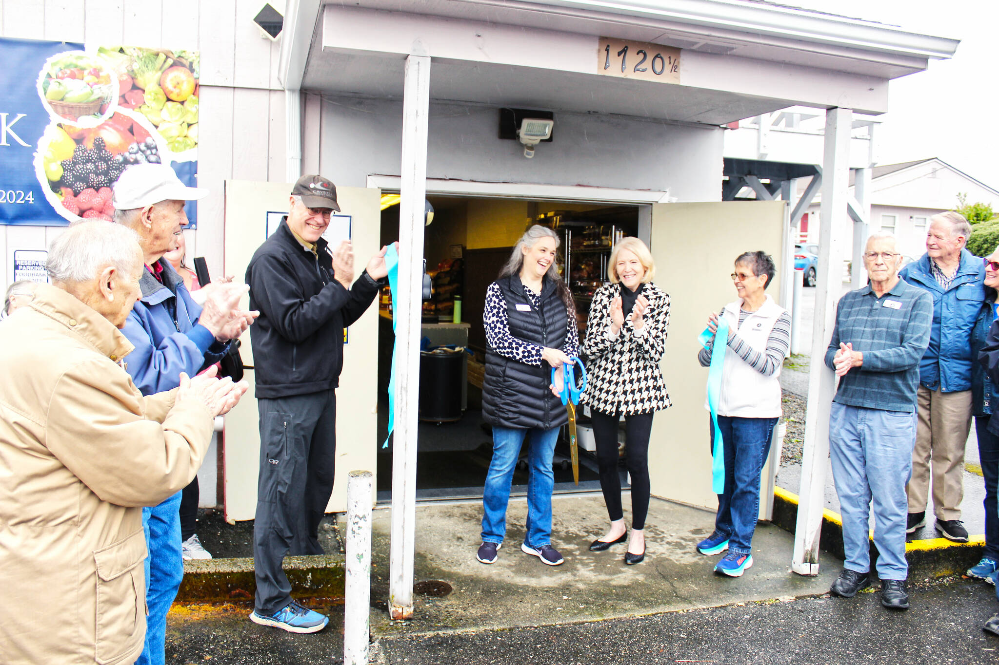 At the ribbon cutting was Plateau Outreach Ministrys Executive Director Elisha Smith-Marshall; Cathy Dormaier, vice president of POMs board of directors; and Food Bank Manager Lynn Lueschen. Photo by Ray Miller-Still
