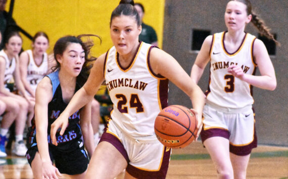 Photo by Kevin Hanson
The Enumclaw High girls’ basketball team defeated Mark Morris Saturday afternoon, earning a berth in the state’s Round of 12 and a trip to the Yakima Valley SunDome. In this photo Emma Holt (24) pushes the ball across midcourt while looking for open teammates.