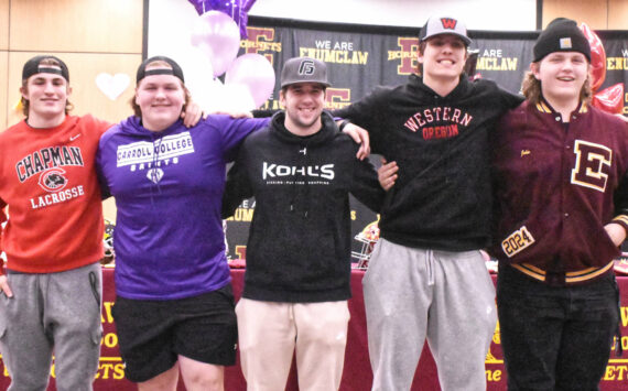 PHOTO BY KEVIN HANSON 
Featured during a recent signing ceremony at Enumclaw High were (from left) Anthony Mills, Ryan Fehr, Riley Rutledge, Gunnar Trachte and John Carrier. Wyatt Neu was not present at the ceremony.