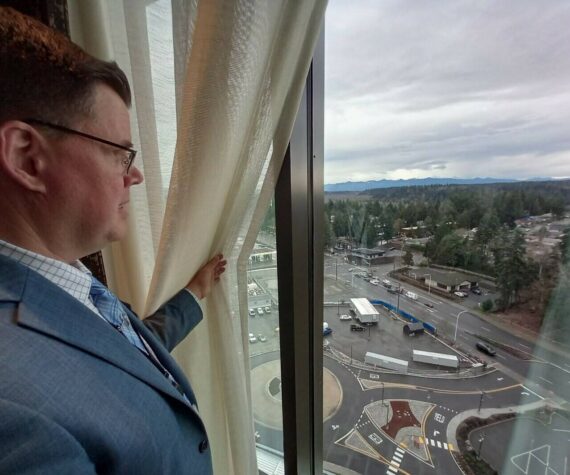 The Muckleshoot Casino Resort offers some stellar views, as shown here by Robert Dearstine, Executive Director of Resort Operations. Photo by Robert Whale/Auburn Reporter