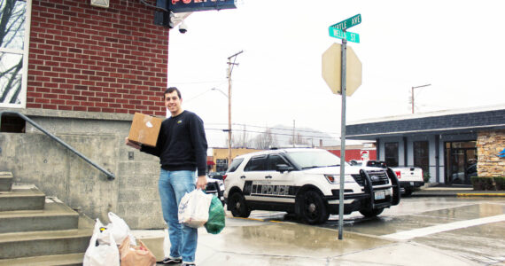 Bryson Fico with his book donations for the Enumclaw jail. Photo by Ray Miller-Still