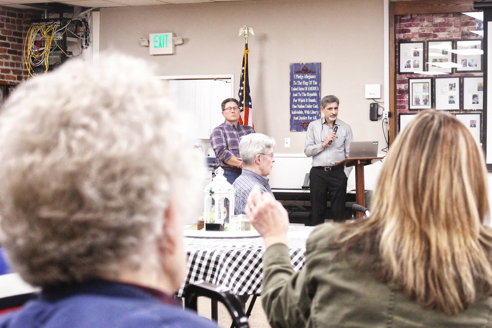Enumclaw Mayor Jan Molinaro, other city staff members and city councilmembers fielded questions about the proposed community center during a March 14 open house. Photo by Ray Miller-Still