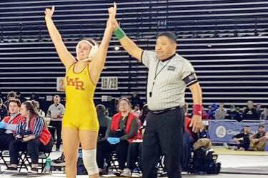 Photo courtesy White River High School
White River High School Girl’s Lilyana Lamothe being presented as the individual wrestling champion last February.