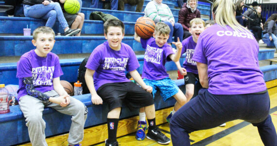 Photo by Ray Miller-Still
An Enumclaw Parks and Rec coach pumping up her youth athletes during halftime at a Feb. 27 game at Thunder Mountain Middle School.