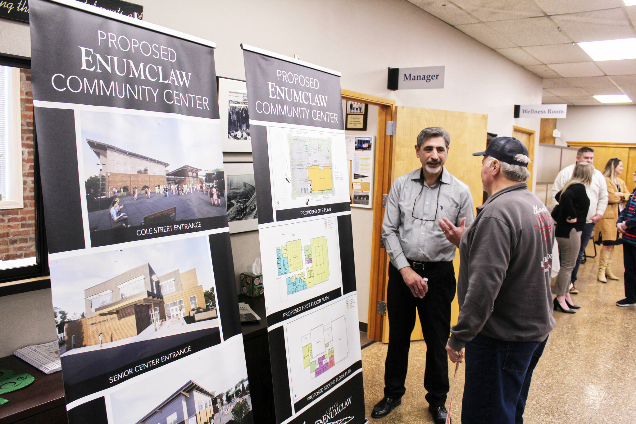 Enumclaw Mayor Jan Molinaro answering questions about the proposed community center right before the March 14 open house got underway. Photo by Ray Miller-Still