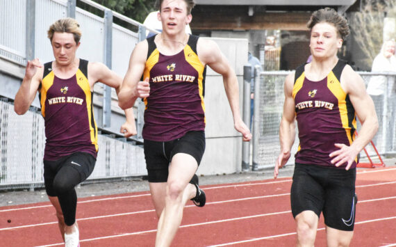 Photo by Kevin Hanson
White River’s track and field athletes raced to easy team victories the afternoon of April 10, swamping the visitors from Foss High. In these photos, a boys’ race featured (from left) Hunter Maris, Tyce Donovan and Tate Bowen.