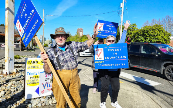 Photo by Ray Miller-Still
Supporters of the $19.5 million bond measure to build an Enumclaw community center gathered at the corners of Griffin Avenue and Porter Street on April 22 to encourage people to vote for the project.
