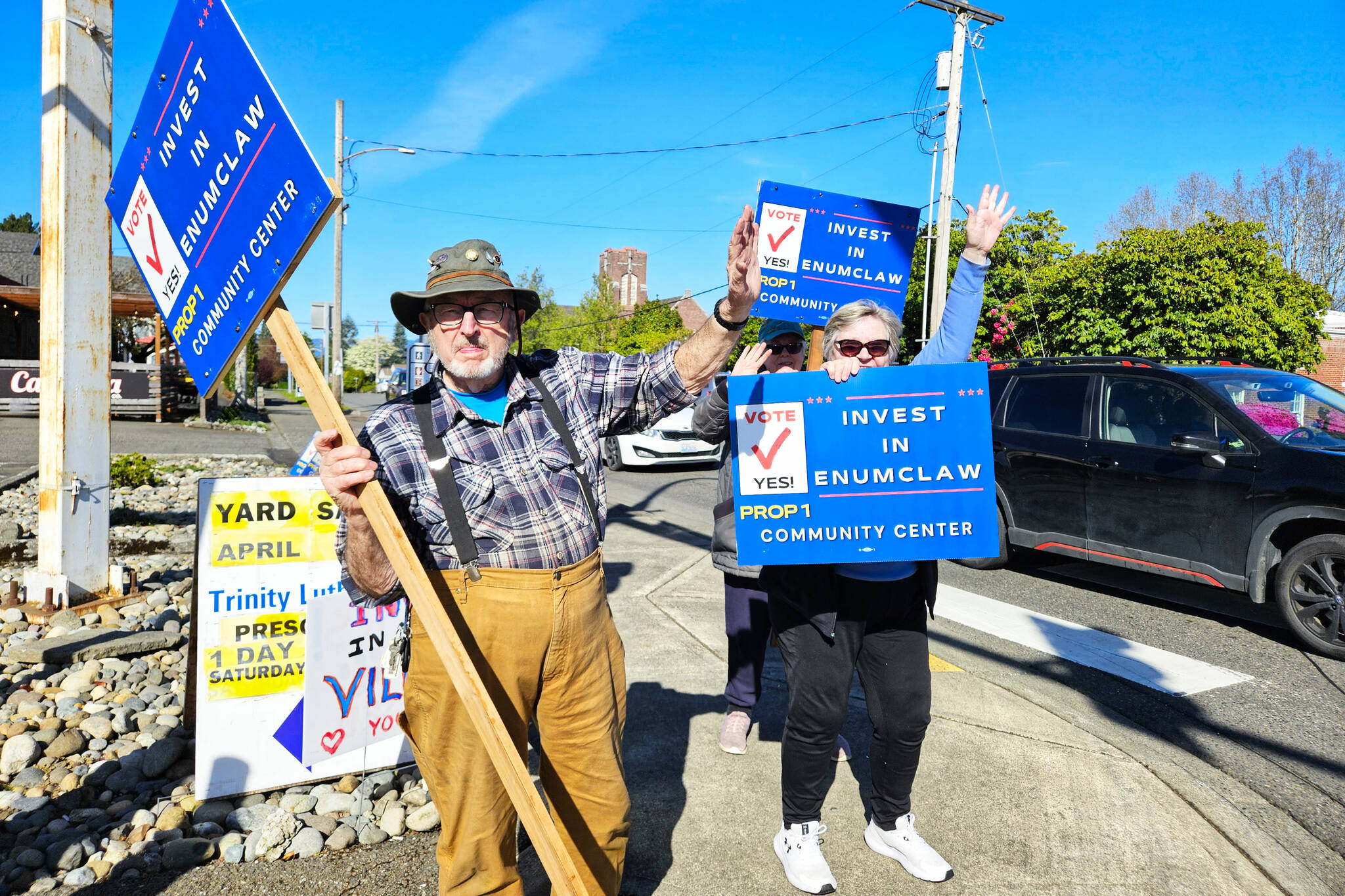 Photo by Ray Miller-Still
Supporters of the $19.5 million bond measure to build an Enumclaw community center gathered at the corners of Griffin Avenue and Porter Street on April 22 to encourage people to vote for the project.