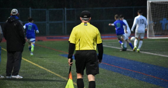 Photo of an assistant referee. Ben Ray / Sound Publishing